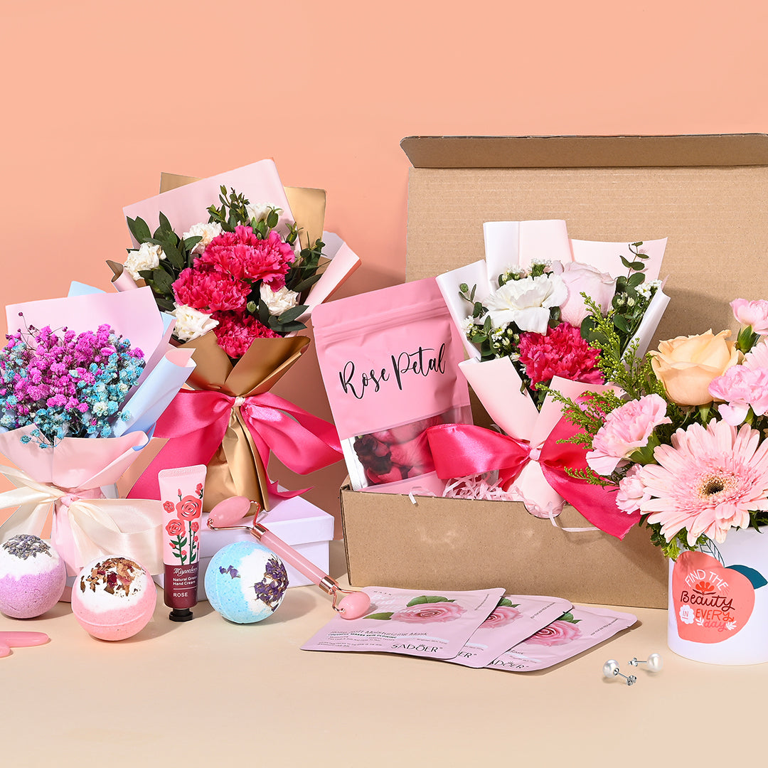 Bouquets and gift boxes arranged and ready to be packed